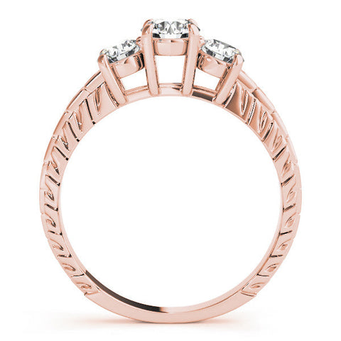 Rose gold Three-Stone Oval Cut Diamond Ring with Channel-Set Band and Prong Setting