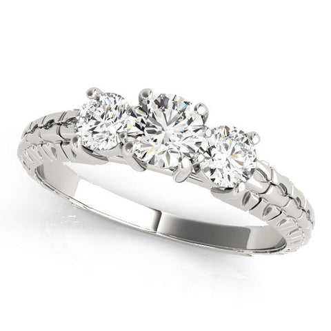 White gold Three-Stone Cushion Cut Diamond Ring with Channel-Set Band and Prong Setting
