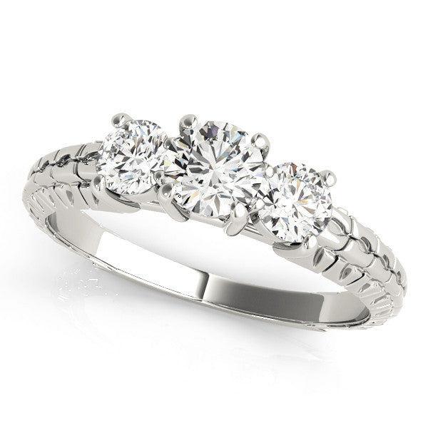 Platinum Three-Stone Radiant Cut Diamond Ring with Channel-Set Band and Prong Setting