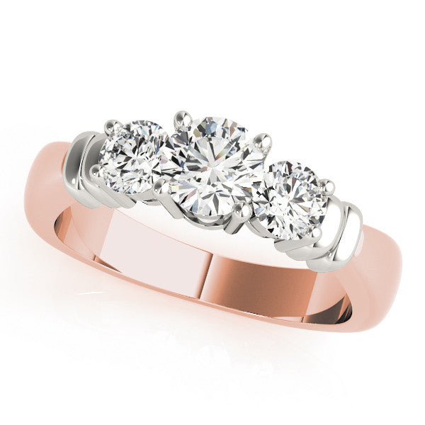 Rose gold Three-Stone Round Cut Diamond Ring with Channel Band and Prong Setting