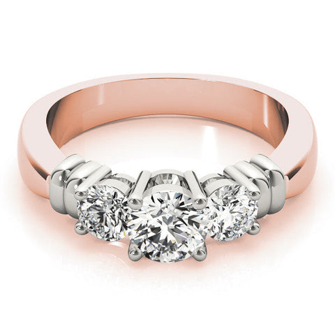 Rose gold Three-Stone Round Cut Diamond Ring with Channel Band and Prong Setting