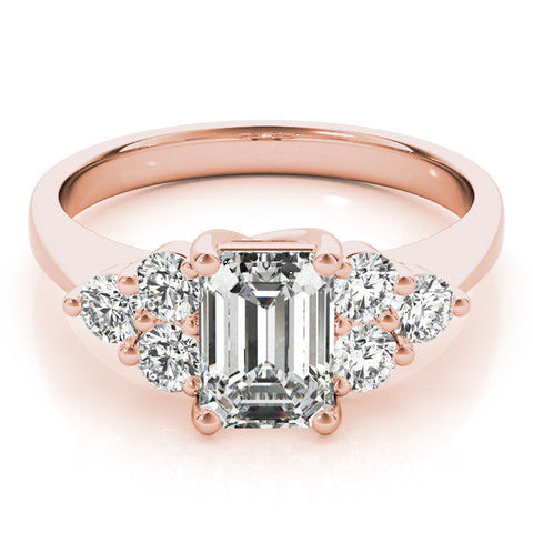Rose gold Emerald Cut Diamond Cluster Ring with Round Accent Stones and Prong Setting on a Classic Band