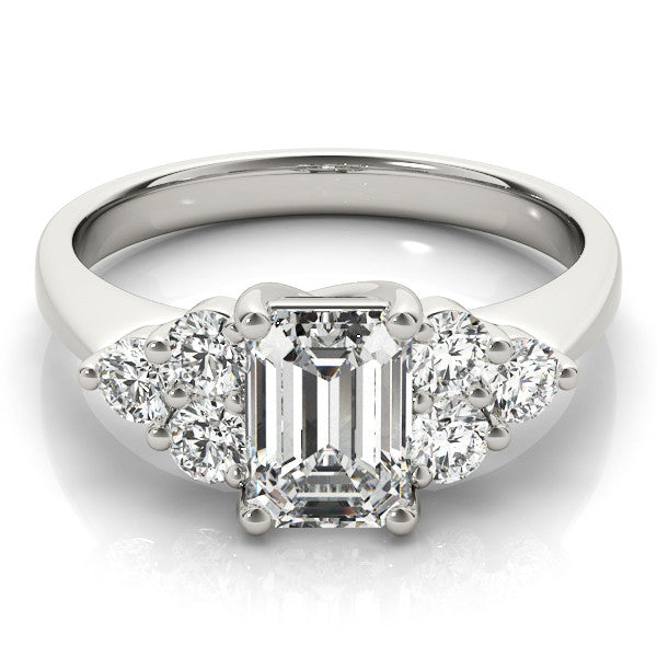 White gold Emerald Cut Diamond Cluster Ring with Round Accent Stones and Prong Setting on a Classic Band