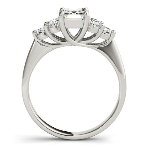 Silver Emerald Cut Diamond Cluster Ring with Round Accent Stones and Prong Setting on a Classic Band