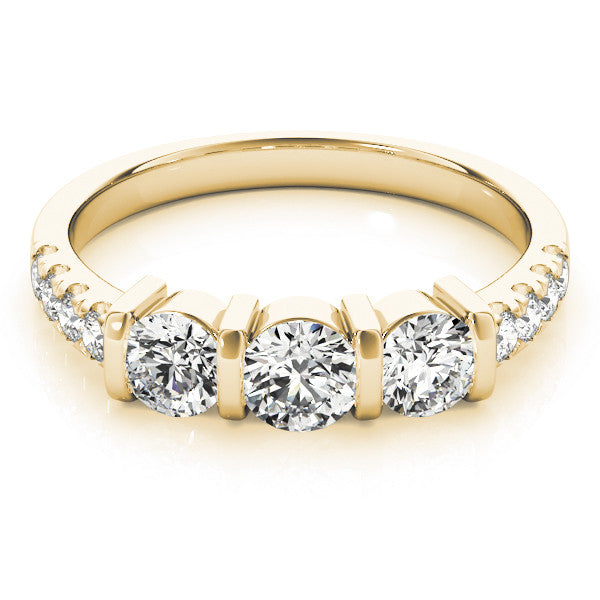 Yellow gold Oval Brilliant Trilogy Channel Set Diamond Ring with Bar Prongs