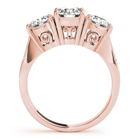 Rose gold Three-Stone Cushion Diamond Engagement Ring with Prong Setting on a Classic Band