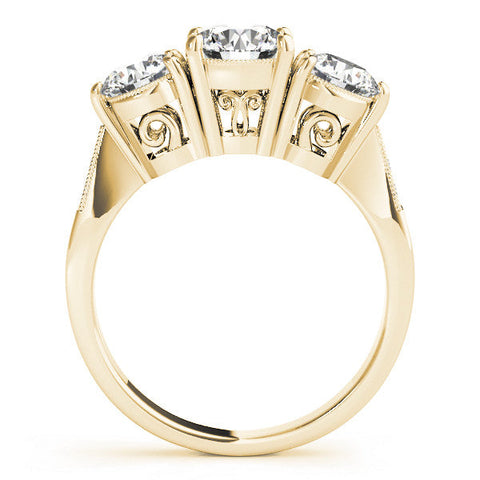 Yellow gold Three-Stone Cushion Diamond Engagement Ring with Prong Setting on a Classic Band