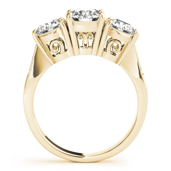 Yellow gold Three-Stone Oval Diamond Engagement Ring with Prong Setting on a Classic Band