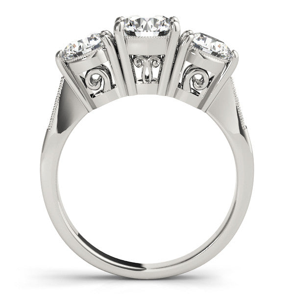 White gold Three-Stone Cushion Diamond Engagement Ring with Prong Setting on a Classic Band
