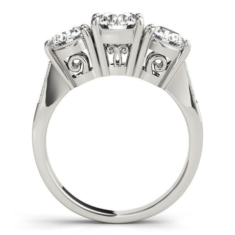 Silver Three-Stone Round Diamond Engagement Ring with Prong Setting on a Classic Band