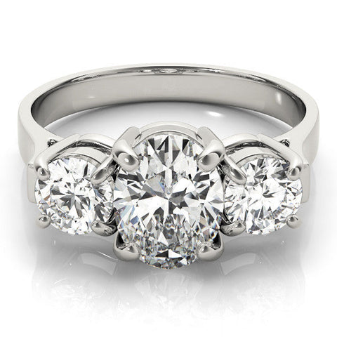 Silver Three-Stone Oval Cut Diamond Ring with Round Accent Stones, Prong Setting, and Classic Band