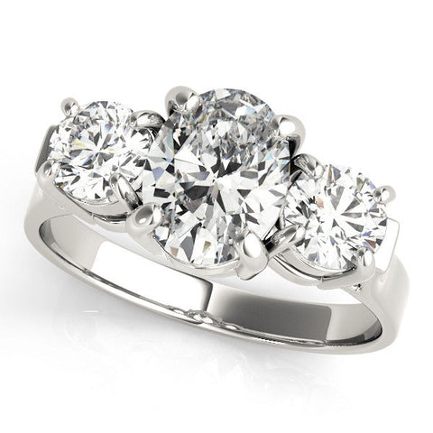 Silver Three-Stone Oval Cut Diamond Ring with Round Accent Stones, Prong Setting, and Classic Band