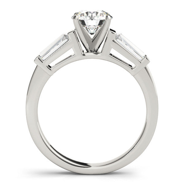 White gold Heart Cut Diamond Solitaire Ring with Tapered Baguette Accents and Four-Prong Setting