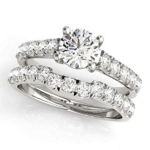 Platinum Round Cut Diamond Pavé Band Solitaire with Four-Prong Setting