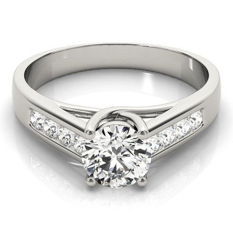 White gold Round Brilliant Channel-Set Solitaire Ring with Four-Prong Setting