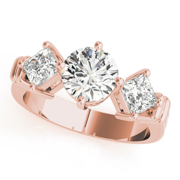 Rose gold Three-Stone Cushion and Princess Cut Diamond Ring with Channel Band and Four-Prong Setting