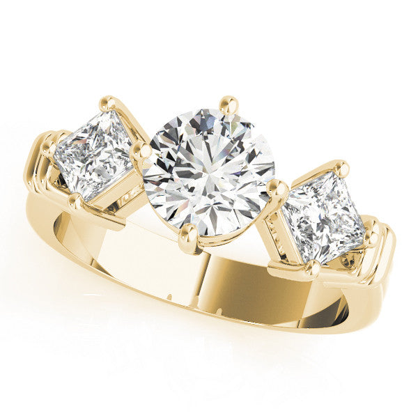 Yellow gold Three-Stone Marquise and Princess Cut Diamond Ring with Channel Band and Four-Prong Setting