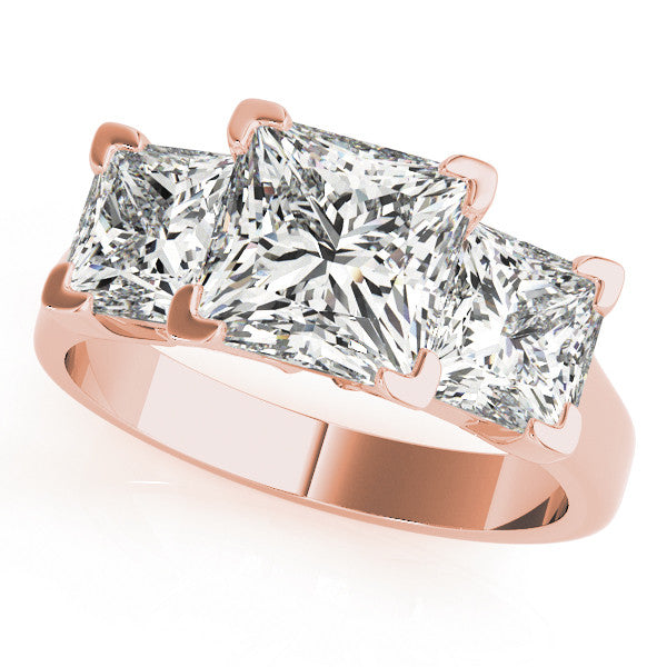 Rose gold Three-Stone Cushion Cut Diamond Ring with Channel Set Band and Four-Prong Setting