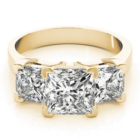 Yellow gold Three-Stone Cushion Cut Diamond Ring with Channel Set Band and Four-Prong Setting