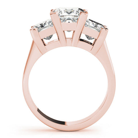Rose gold Three-Stone Oval Cut Diamond Ring with Channel Set Band and Four-Prong Setting