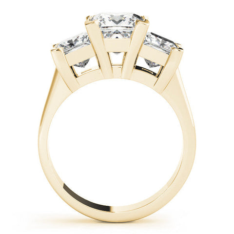 Yellow gold Three-Stone Pear Cut Diamond Ring with Channel Set Band and Four-Prong Setting