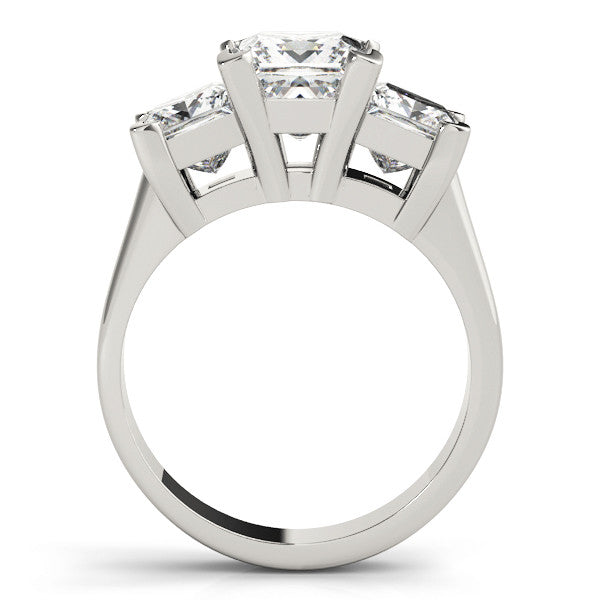 White gold Three-Stone Oval Cut Diamond Ring with Channel Set Band and Four-Prong Setting