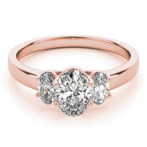 Rose gold Radiant Three-Stone Diamond Ring with Prong Setting on a Classic Band