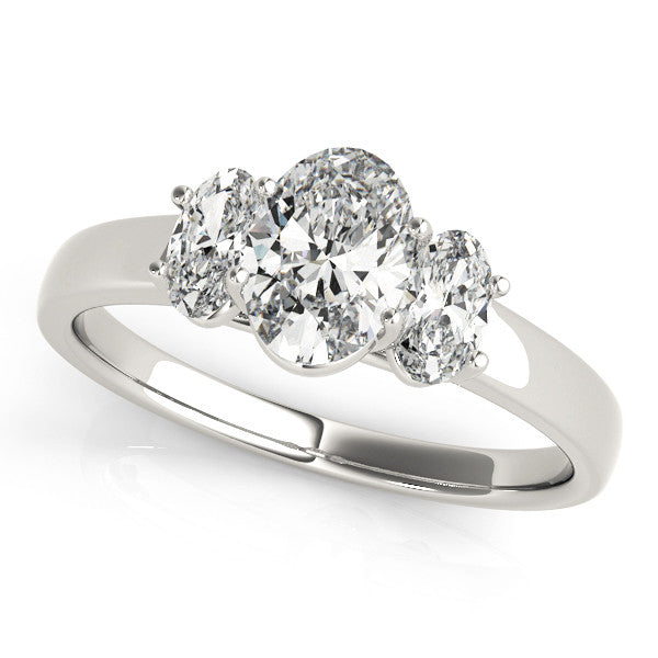 White gold Radiant Three-Stone Diamond Ring with Prong Setting on a Classic Band