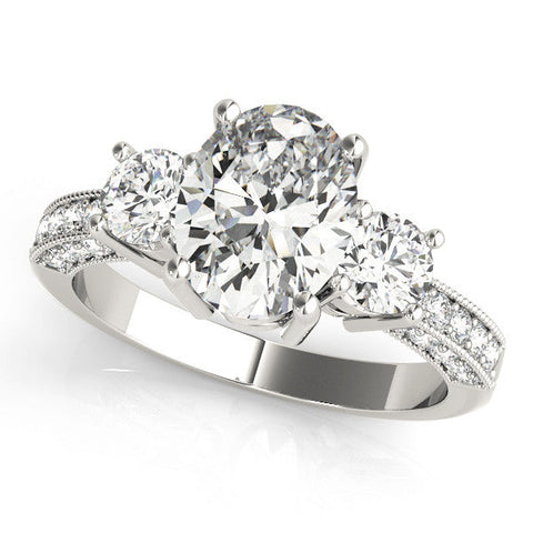 White gold Cushion Three-Stone Diamond Ring with Pavé Band and Four-Prong Setting