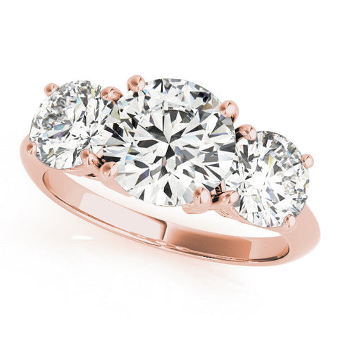 Rose gold Three-Stone Cushion Cut Diamond Engagement Ring with Prong Setting on a White Gold Band