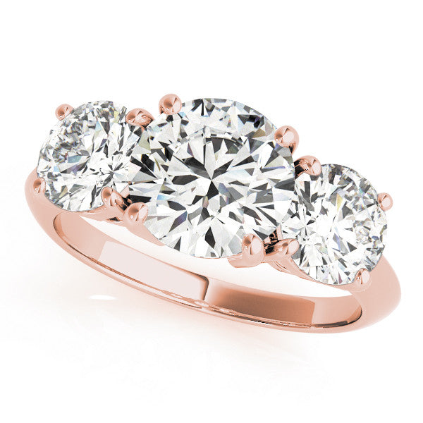 Rose gold Three-Stone Oval Cut Diamond Engagement Ring with Prong Setting on a White Gold Band