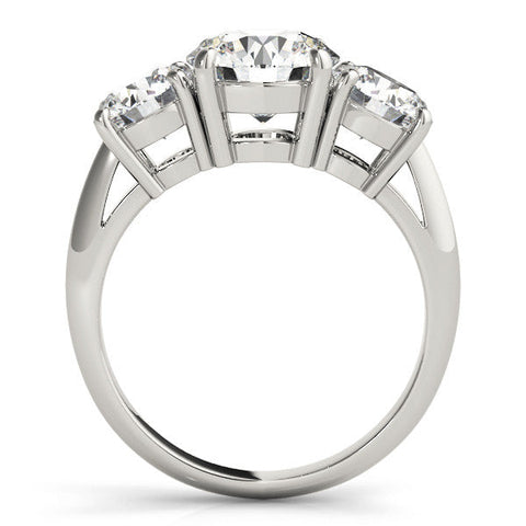 Platinum Three-Stone Marquise Cut Diamond Engagement Ring with Prong Setting on a White Gold Band
