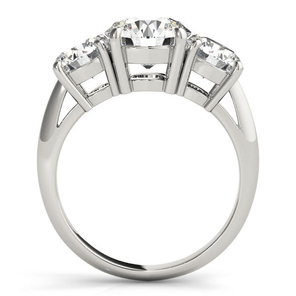 Silver Three-Stone Round Cut Diamond Engagement Ring with Prong Setting on a Silver Band