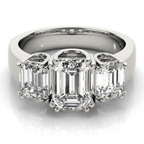 White gold Three-Stone Emerald Cut Diamond Ring with Channel Set Band and Four-Prong Setting
