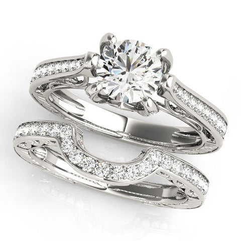 Platinum Round Cut Solitaire Diamond Ring with Pavé Band and Six-Prong Setting