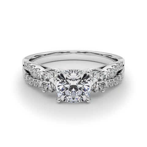 Platinum Cushion Three-Stone Diamond Ring with Pavé Split Shank and Four-Prong Setting