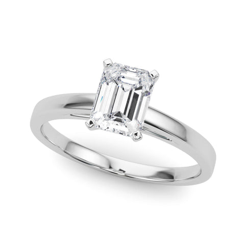 Silver Emerald Solitaire Diamond Engagement Ring with Four-Prong Setting on a Classic Band