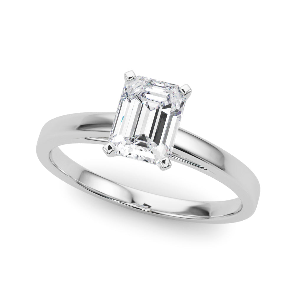 Platinum Emerald Solitaire Diamond Engagement Ring with Four-Prong Setting on a Classic Band