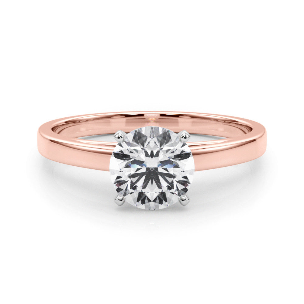 Rose gold Round Solitaire Diamond Engagement Ring with Four-Prong Setting on a Classic Band