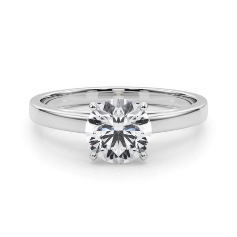 Platinum Round Solitaire Diamond Engagement Ring with Four-Prong Setting on a Classic Band