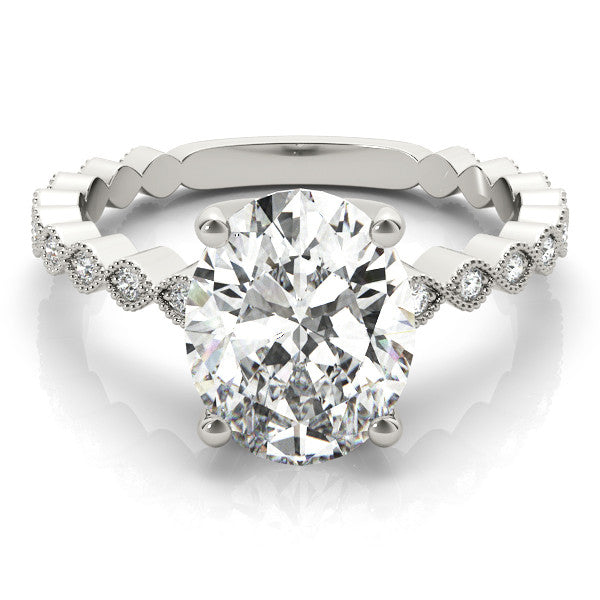 Silver Oval Solitaire Diamond Ring with Infinity Twist Band and Four-Prong Setting