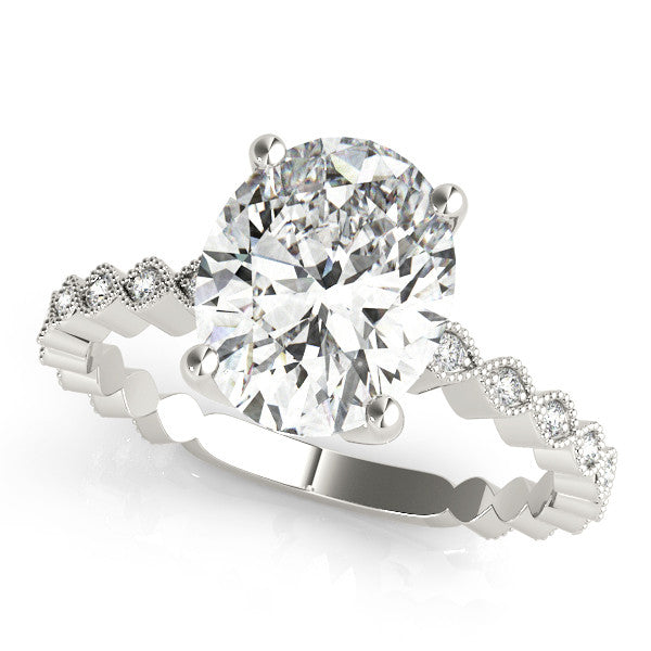Silver Oval Solitaire Diamond Ring with Infinity Twist Band and Four-Prong Setting