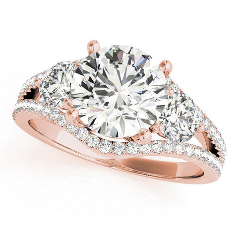 Rose gold Round Brilliant Three-Stone Diamond Ring with Pavé Band and Prong Setting