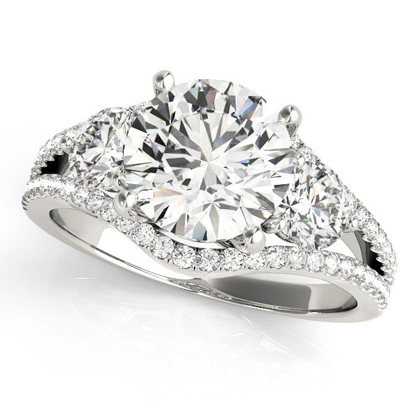 White gold Round Brilliant Three-Stone Diamond Ring with Pavé Band and Prong Setting