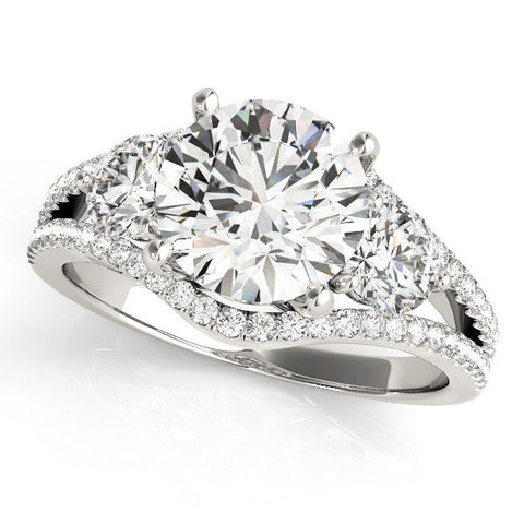 White gold Round Brilliant Three-Stone Diamond Ring with Pavé Band and Prong Setting