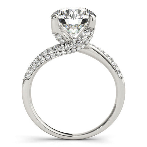 Platinum Round Cut Diamond Solitaire Engagement Ring with Pave Band and Four-Prong Setting