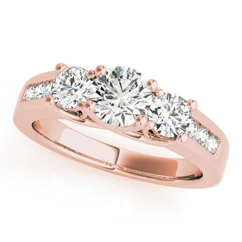 Rose gold Three-Stone Round Cut Channel-Set Diamond Ring with Prong Setting