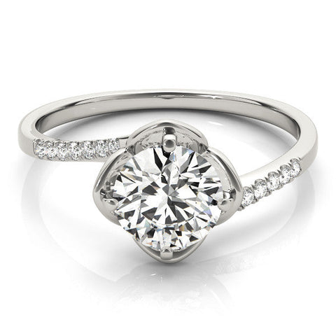 Platinum Round Brilliant Solitaire with Pavé Band and Four-Prong Cushion Setting