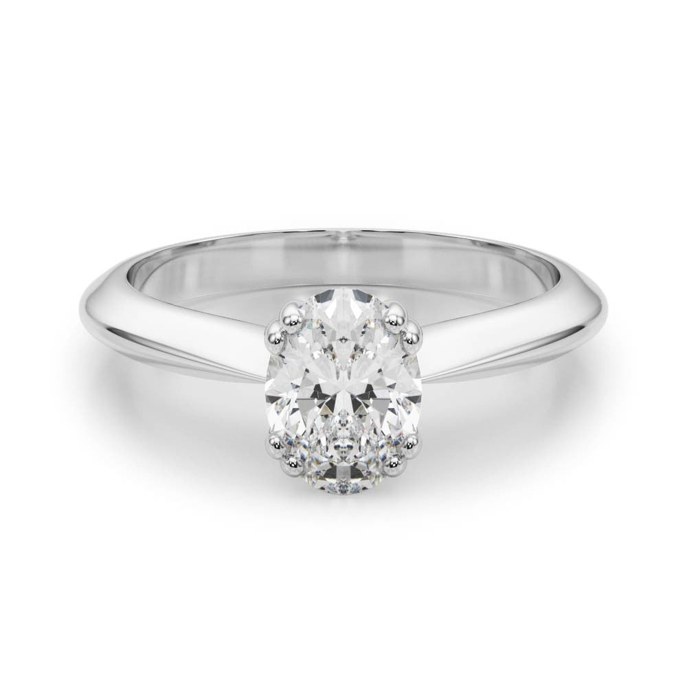Platinum Oval Solitaire Diamond Ring with Four-Prong Setting on a Tapered Band