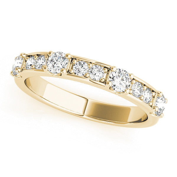 Yellow gold Round Diamond Channel Set Eternity Band with Prong Setting